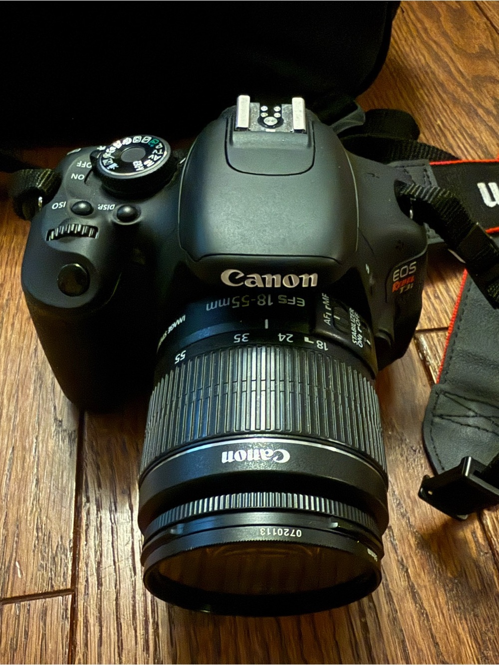 Canon DSLR Camera with Black Body and Black 18-55mm Lens